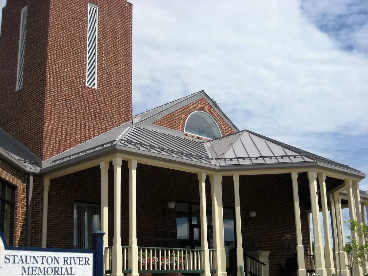 Skilled roofing craftsmen working on a residential roof in Franklin
